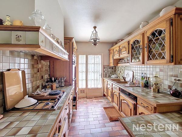 A Vendre Maison de 131 m² habitable de plain-pied avec garage et jardin dans un hameau