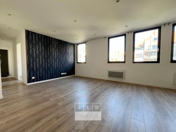 Appartement rénové avec cave et parking