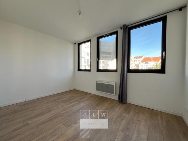 Appartement rénové avec cave et parking