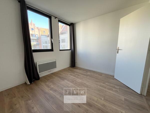 Appartement rénové avec cave et parking