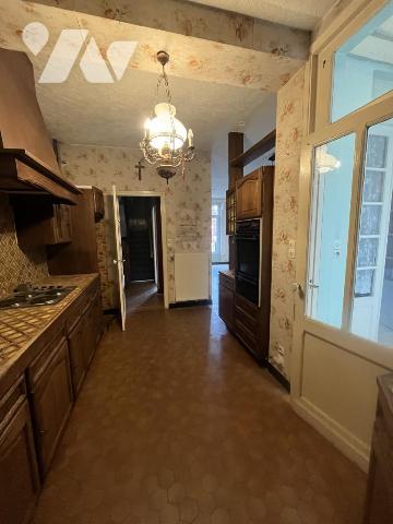 A Vendre FACHES-THUMESNIL Maison semi mitoyenne  de style avec jardin et garage