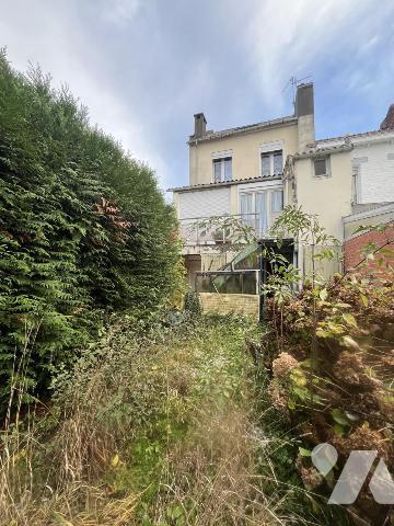 A Vendre FACHES-THUMESNIL Maison semi mitoyenne  de style avec jardin et garage