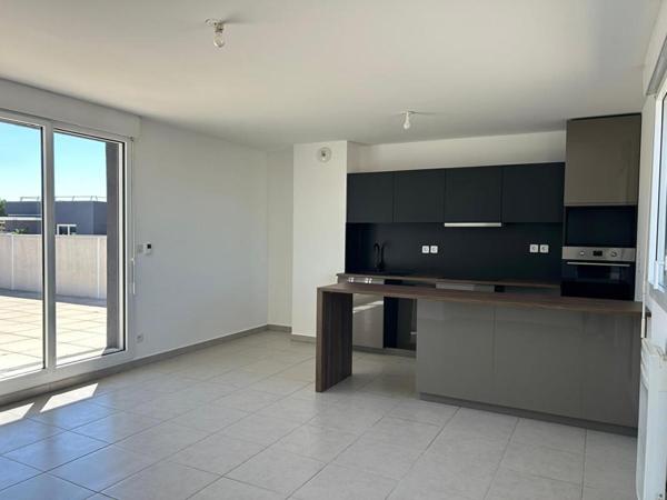 Appartement T3 en attique avec grande terrasse