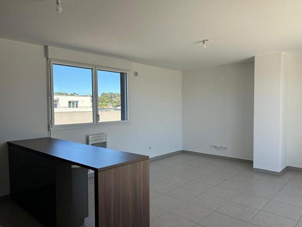 Appartement T3 en attique avec grande terrasse