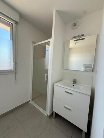 Appartement T3 en attique avec grande terrasse