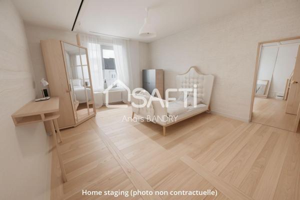 Maison dans un village avec commerces