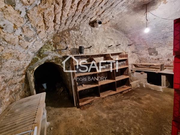 Maison dans un village avec commerces