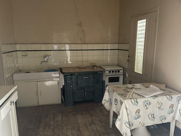 Maison en pierre sur grand terrain