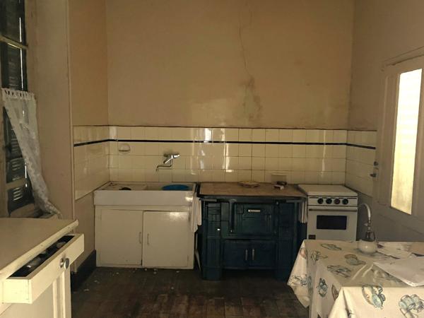 Maison en pierre sur grand terrain