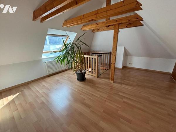 Immeuble de rapport situé en plein centre, comprenant 7 logements et 3 locaux commerciaux et dépen