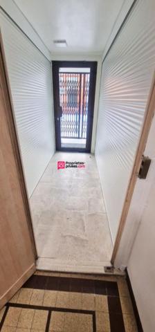 Immeuble de 94 m² avec commerce et logement 3 pièces et 2 chambres