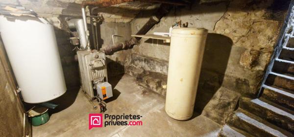 Immeuble de 94 m² avec commerce et logement 3 pièces et 2 chambres