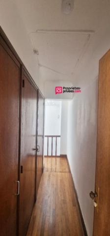 Immeuble de 94 m² avec commerce et logement 3 pièces et 2 chambres