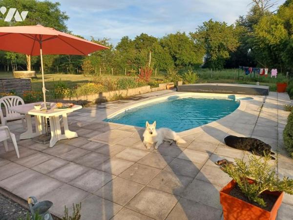 Maison ancienne pleine de charme et en parfait état sur beau terrain de plus de 9000 m²