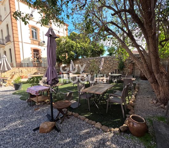 Ensemble immobilier Professionnel ( terrain constructible , restaurant et appartement 80m2)