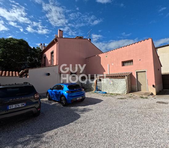 Ensemble immobilier Professionnel ( terrain constructible , restaurant et appartement 80m2)