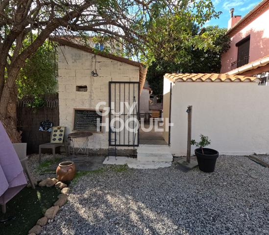 Ensemble immobilier Professionnel ( terrain constructible , restaurant et appartement 80m2)