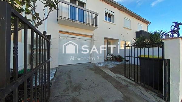 Maison de ville avec garage et exterieur