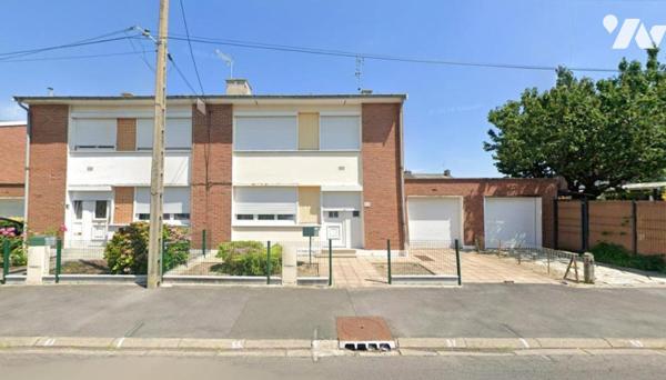 Maison semi individuelle avec garage 