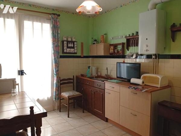 Maison semi individuelle avec garage 