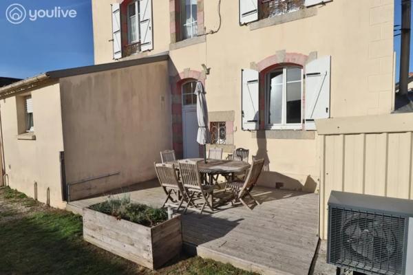 Maison avec jardin proche des commodités