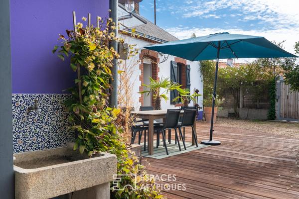 Une maison de charme en parfaite harmonie avec son jardin arboré