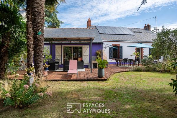 Une maison de charme en parfaite harmonie avec son jardin arboré