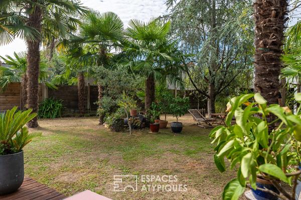 Une maison de charme en parfaite harmonie avec son jardin arboré