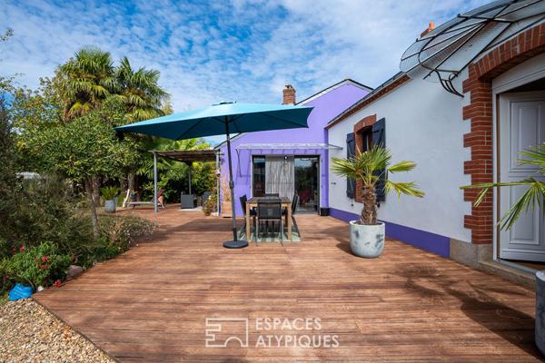 Une maison de charme en parfaite harmonie avec son jardin arboré