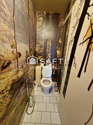 Spacieuse Maison Familiale de 300 m² édifiée sur un terrain arboré de 4025 m² longeant un pztit ruisseau