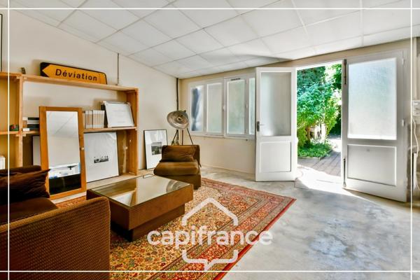 Maison de caractère d’exception centre-ville, 231 m², jardin intimiste, grand garage et dépendance