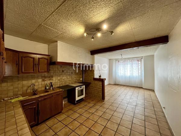 Maison spacieuse au cœur du centre – Gros potentiel à révéler