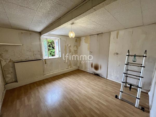 Maison spacieuse au cœur du centre – Gros potentiel à révéler