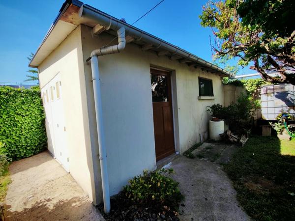 Maison individuelle de 1959 avec sous-sol total.
