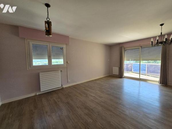 Appartement T3 avec balcon, garage et vue dégagée