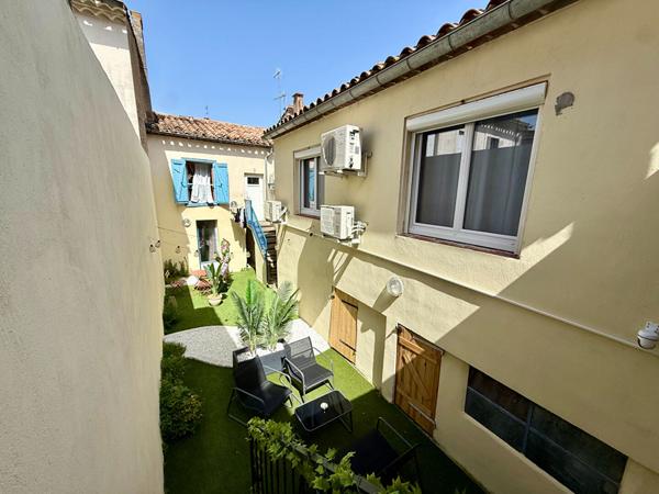 Carcassonne quartier des Capucins immeuble de rapport avec trois lots d'habitation caves cour et remise