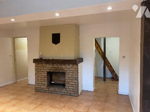 Maison avec cour et garage