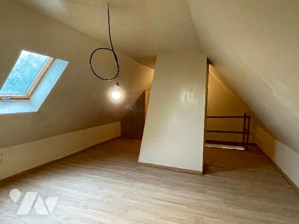 Maison avec cour et garage