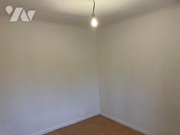 Maison avec cour et garage