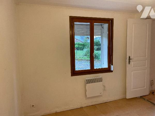 Maison avec cour et garage