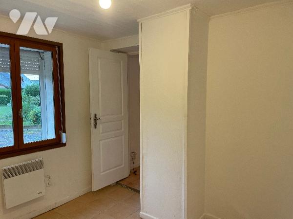 Maison avec cour et garage