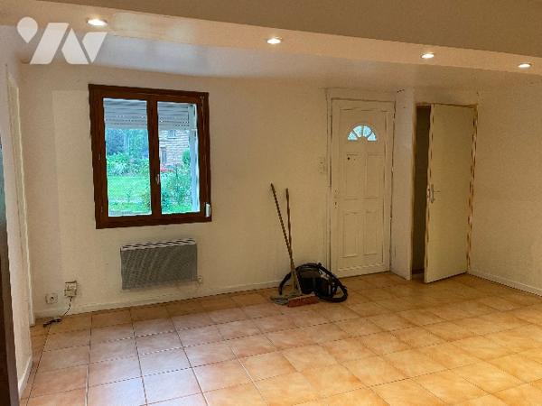 Maison avec cour et garage