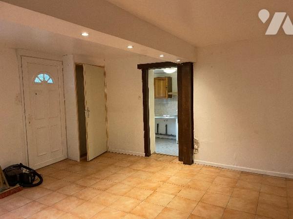 Maison avec cour et garage