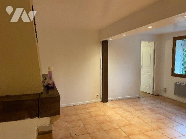 Maison avec cour et garage