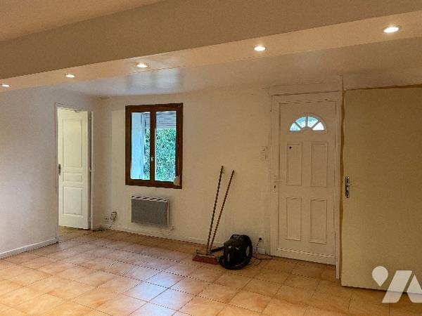 Maison avec cour et garage