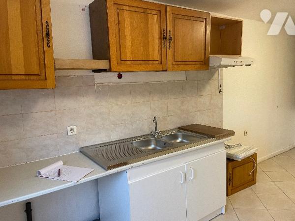 Maison avec cour et garage