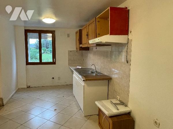 Maison avec cour et garage