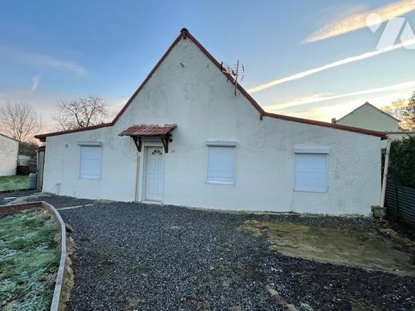 Maison avec cour et garage