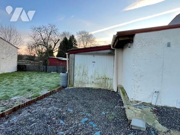 Maison avec cour et garage