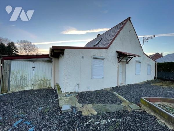 Maison avec cour et garage